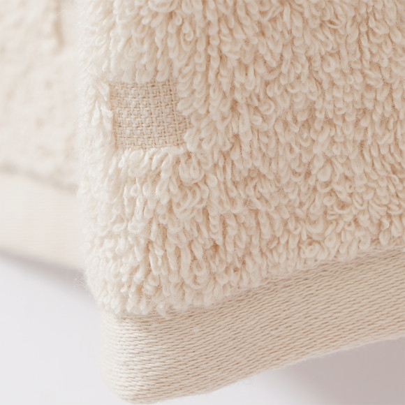 Badlaken met grafische structuur