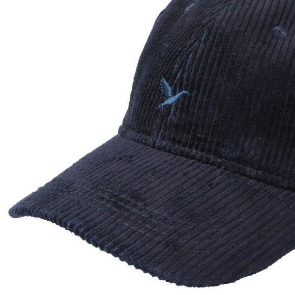 Pet van corduroy met borduursel