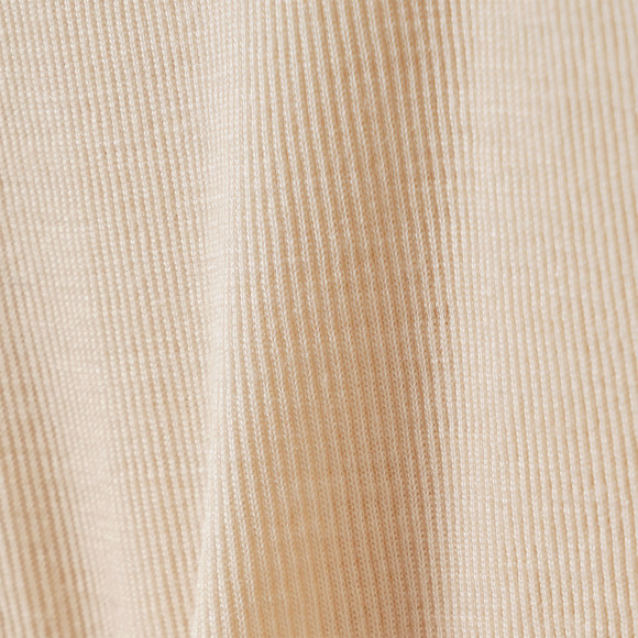 Babybody van wol en zijde met geribde textuur