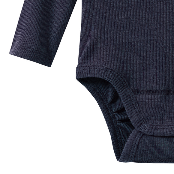 Babybody van wol en zijde met geribde textuur