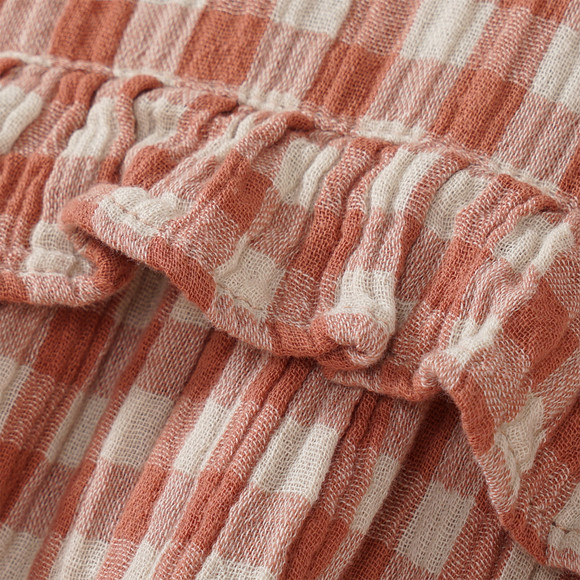 Babyjurk van mousseline met ruitenpatroon