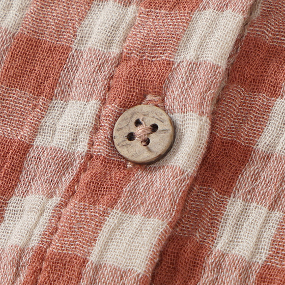 Babyjurk van mousseline met ruitenpatroon