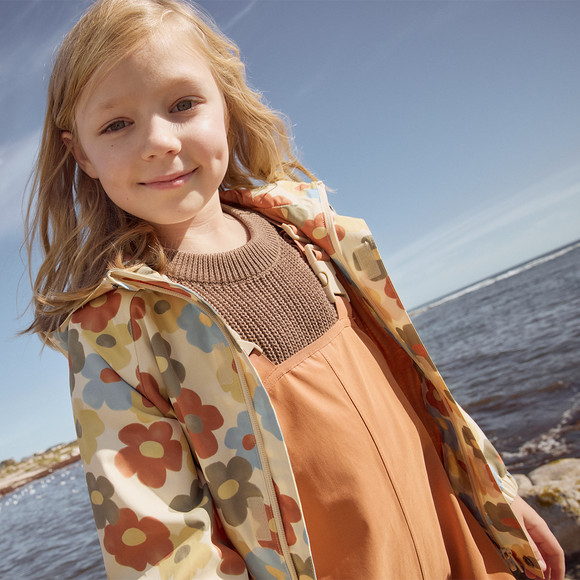 Meisjesregenjas met bloemen