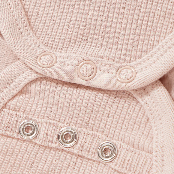 Newborn wikkelbody om mee te groeien