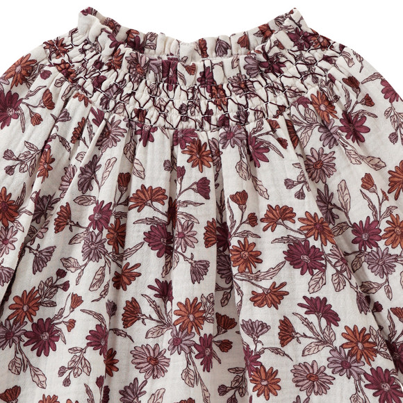 Mousseline blouse voor baby’s met smokwerk