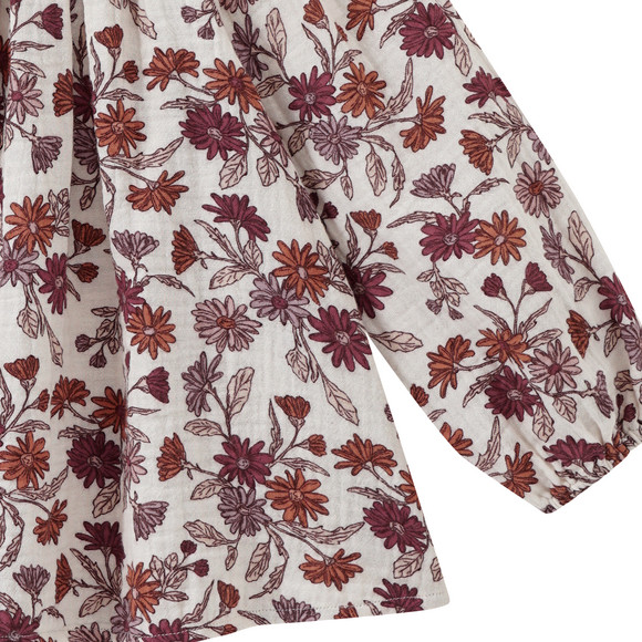 Mousseline blouse voor baby’s met smokwerk