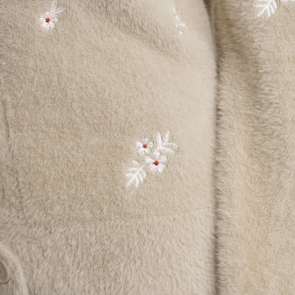 Damesvest met bloemenborduursel