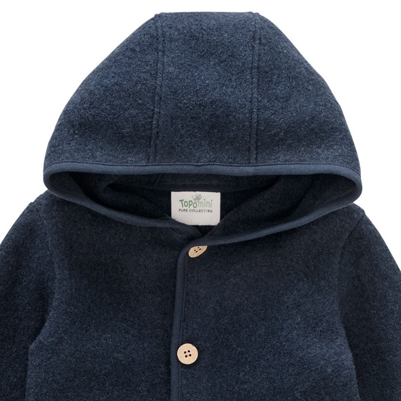 Wollen babyvest met omgeslagen boorden