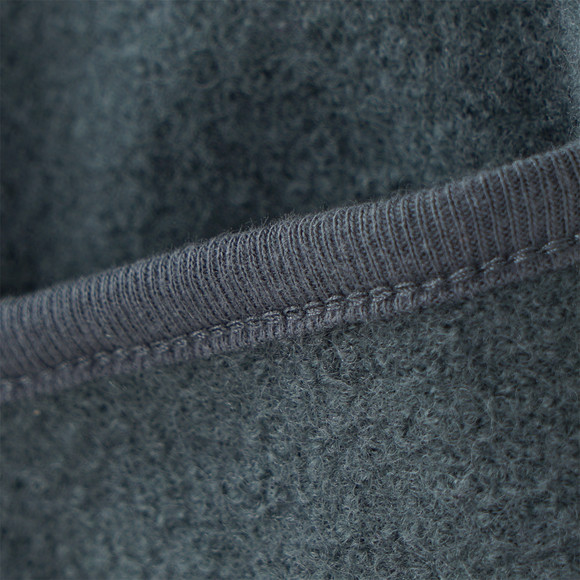 Wollen babyvest met omgeslagen boorden