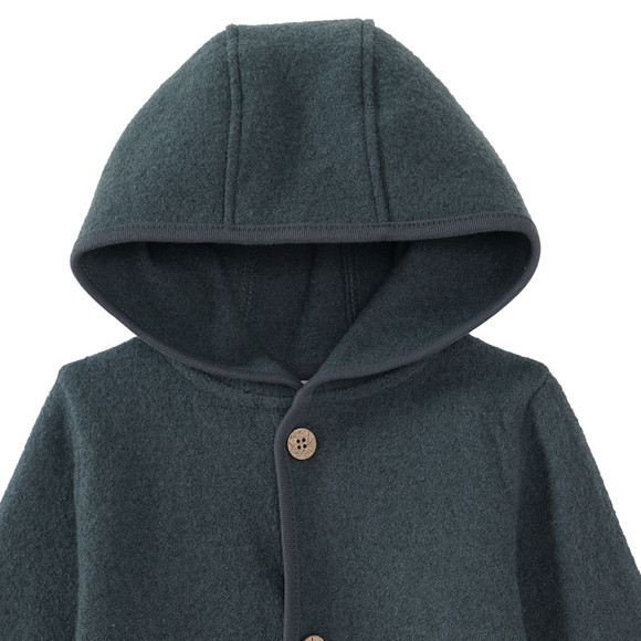 Wollen babyvest met omgeslagen boorden