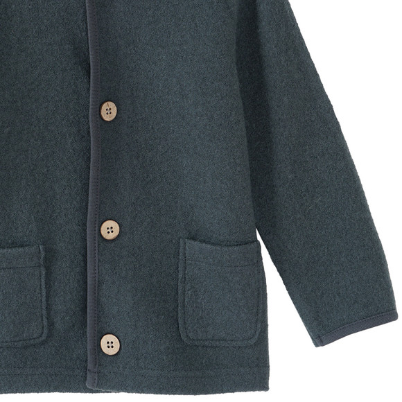 Wollen babyvest met omgeslagen boorden