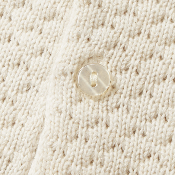 Gebreide babyjurk met dierenapplicatie