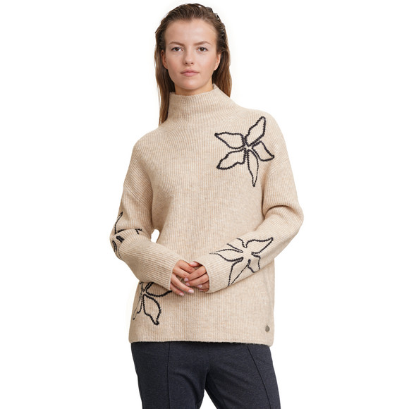 Gebreide damestrui met borduursel
