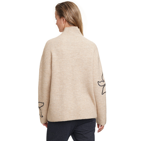 Gebreide damestrui met borduursel