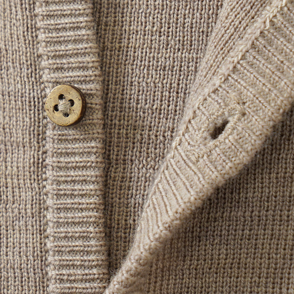 Effen wollen vestje voor pasgeborenen