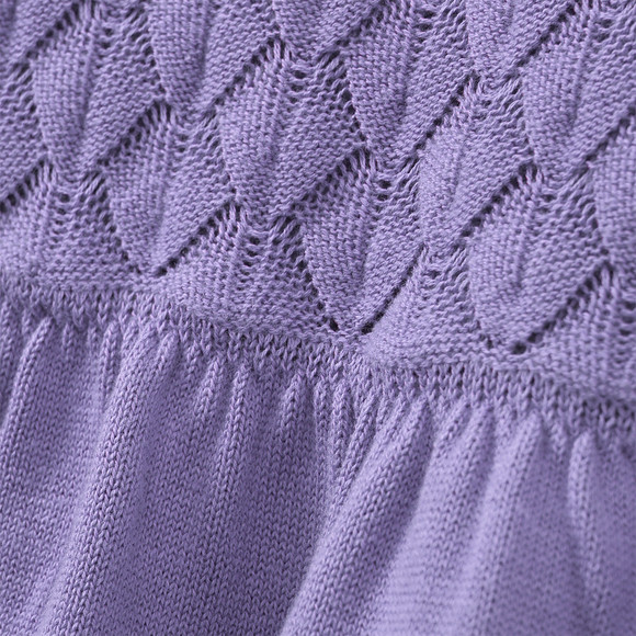 Gebreide meisjesjurk met honingraatstructuur