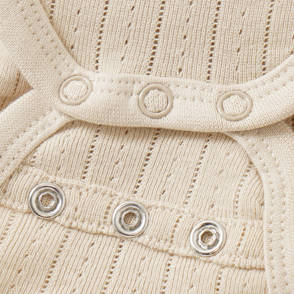 Newborn Wickelbody mit Lochmuster