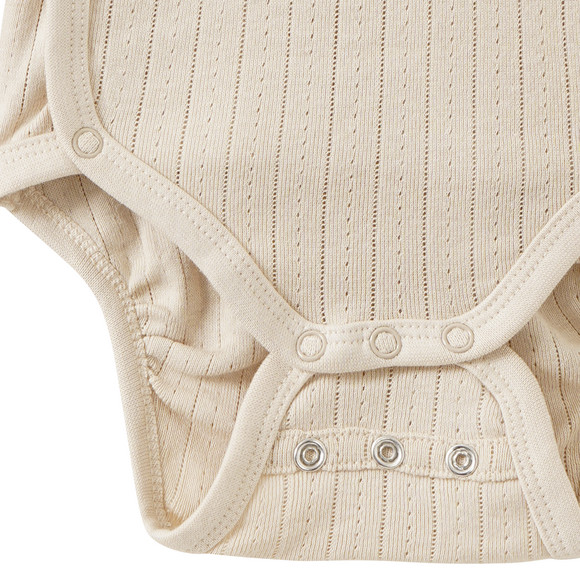 Newborn Wickelbody mit Lochmuster