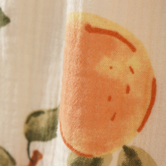 Meisjes mousseline jurk met oranje patroon