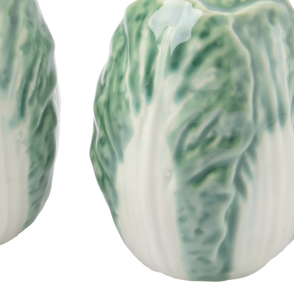 Zout- en peperstrooier in koolontwerp