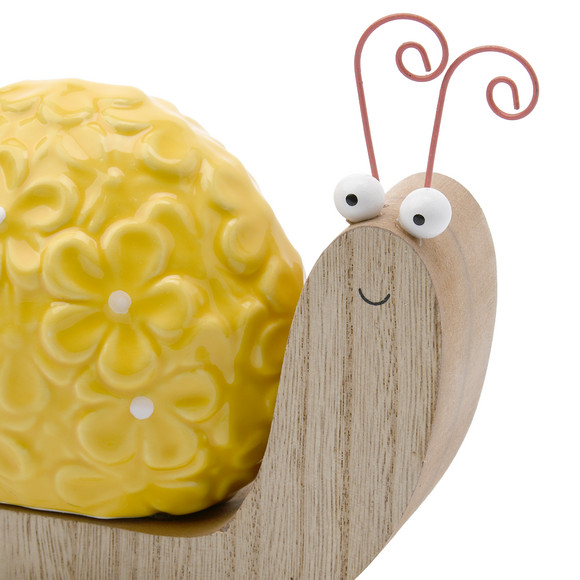 Decoratieve slak met keramische bloem