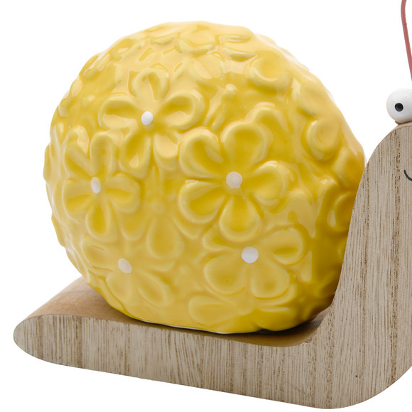 Decoratieve slak met keramische bloem