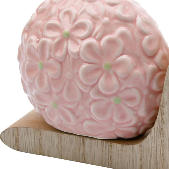 Decoratieve slak met keramische bloem