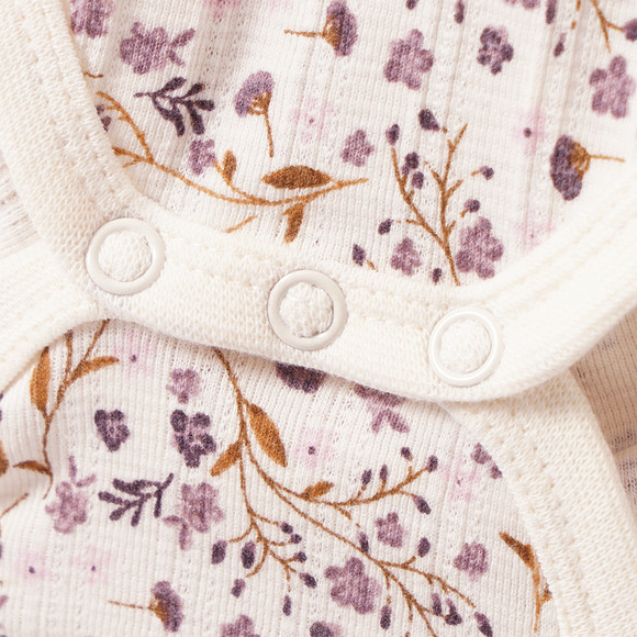 Babybody met lange mouwen en bloemetjes
