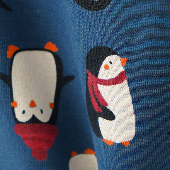 2 babyhemdjes met pinguïnmotieven