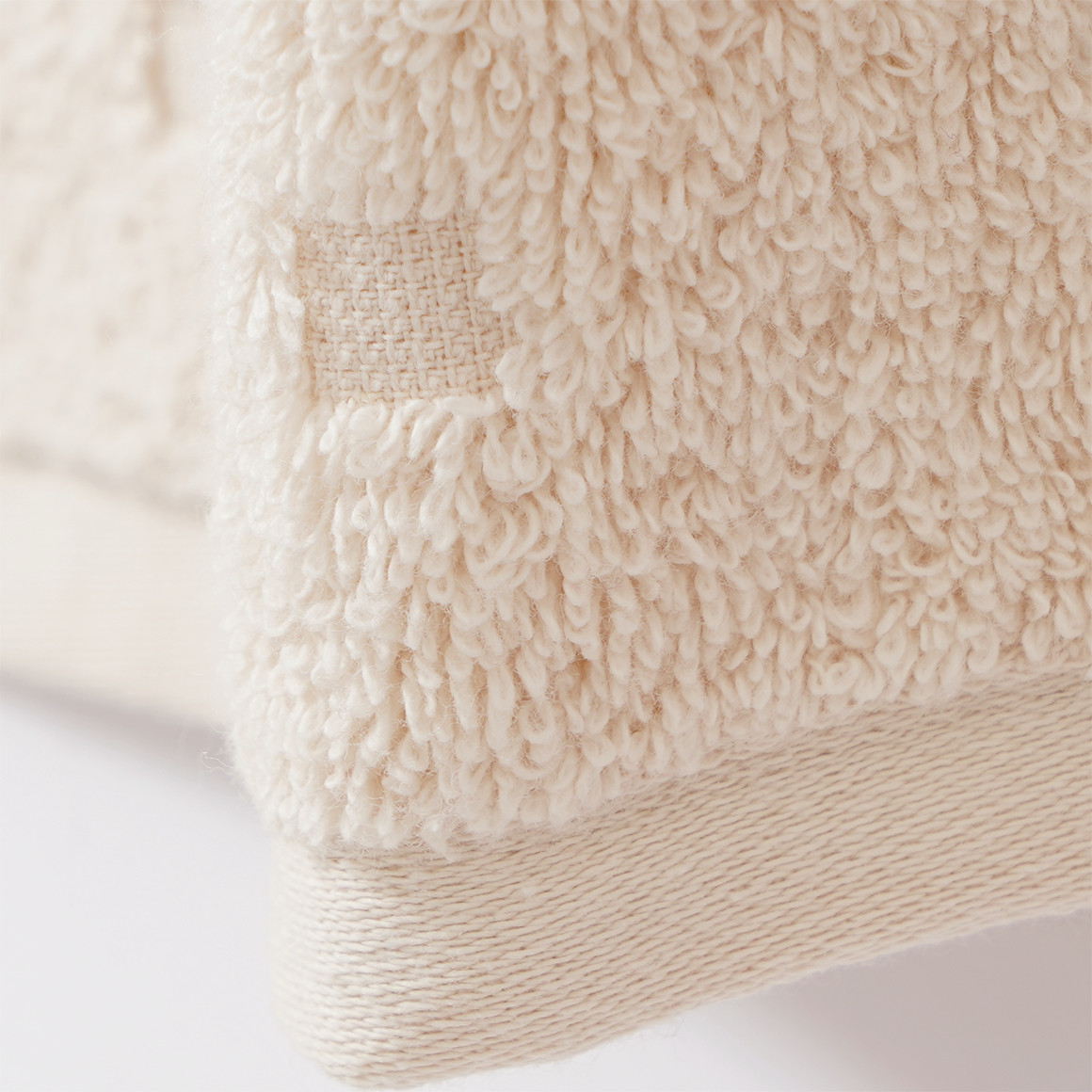 Badlaken met grafische structuur