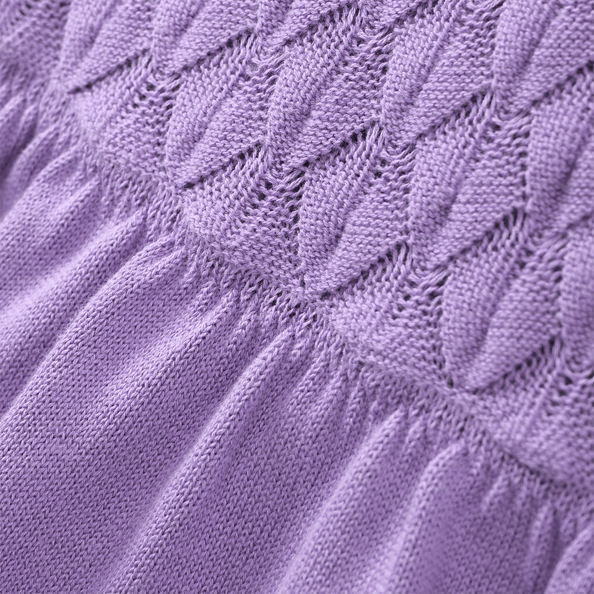 Gebreide meisjesjurk met honingraatstructuur