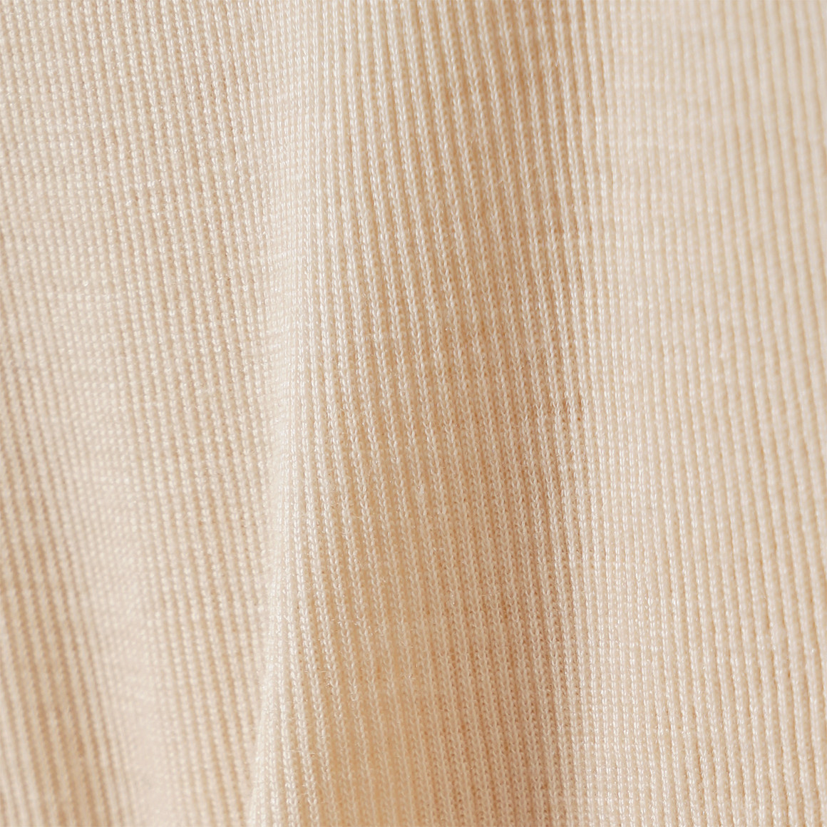 Babybody van wol en zijde met geribde textuur