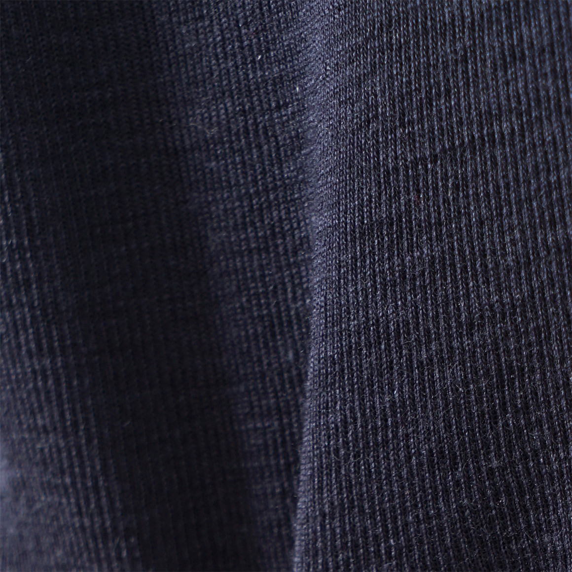 Babybody van wol en zijde met geribde textuur