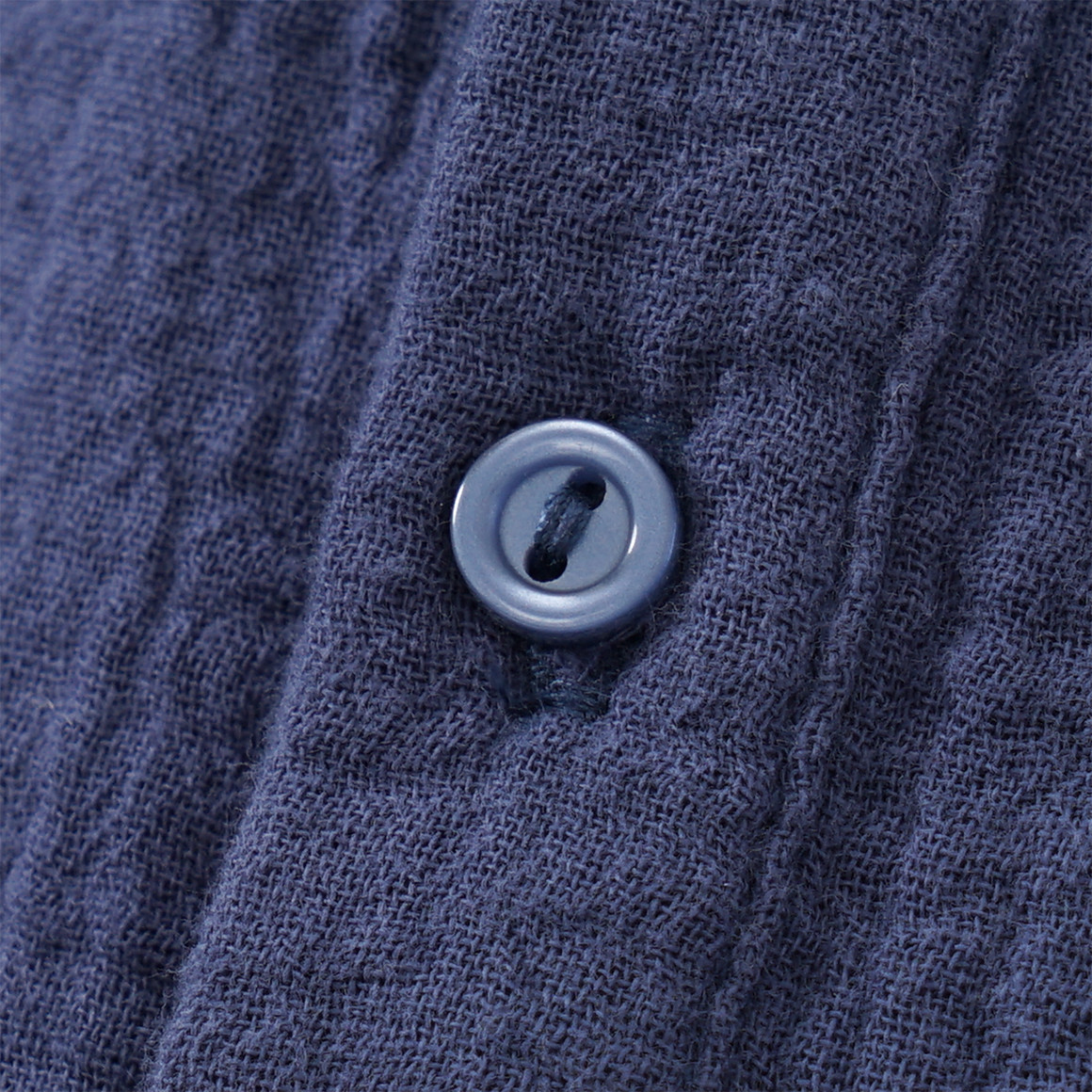 Mousseline baby-overall met borduursel