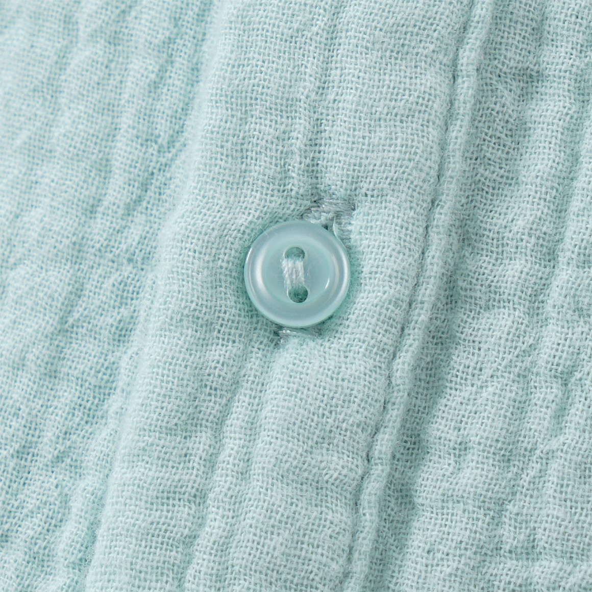 Mousseline baby-overall met borduursel