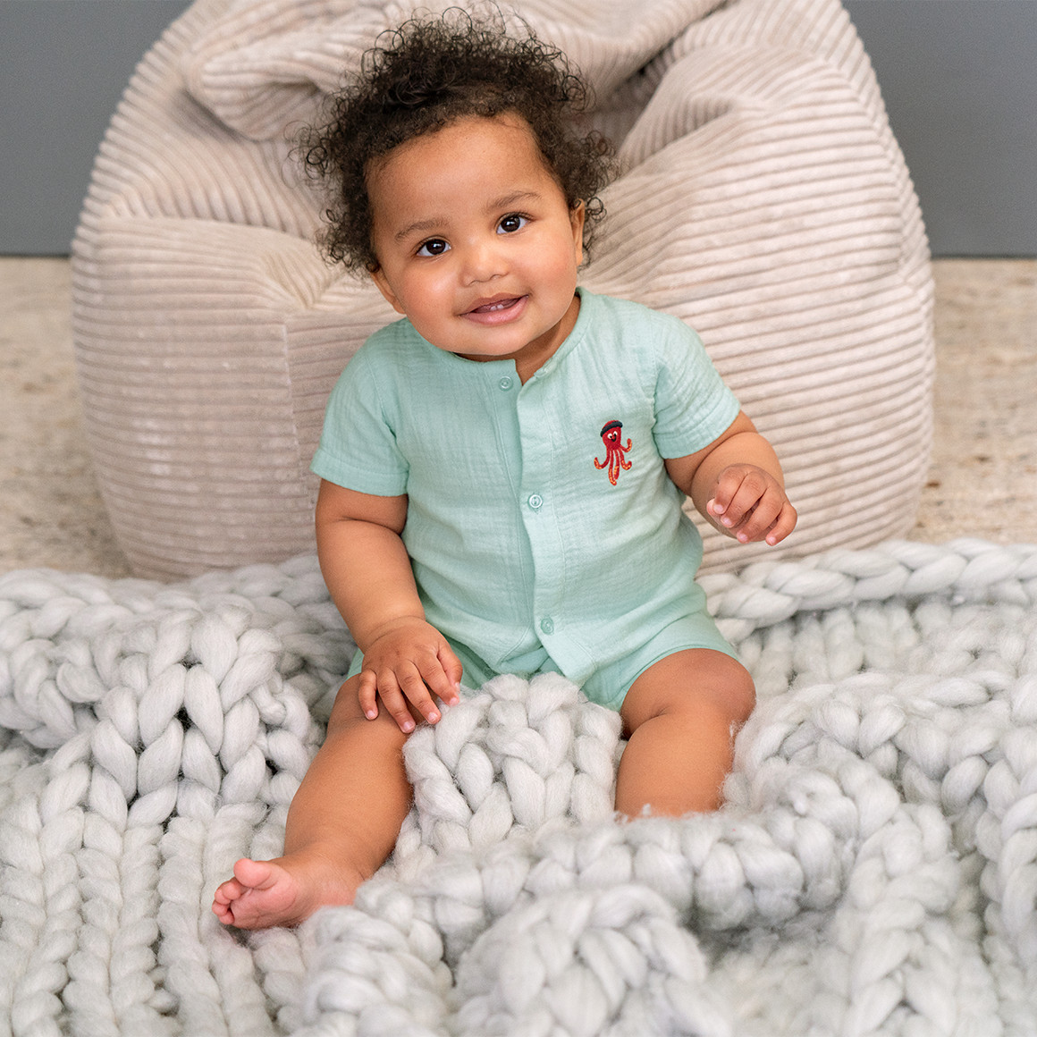 Mousseline baby-overall met borduursel