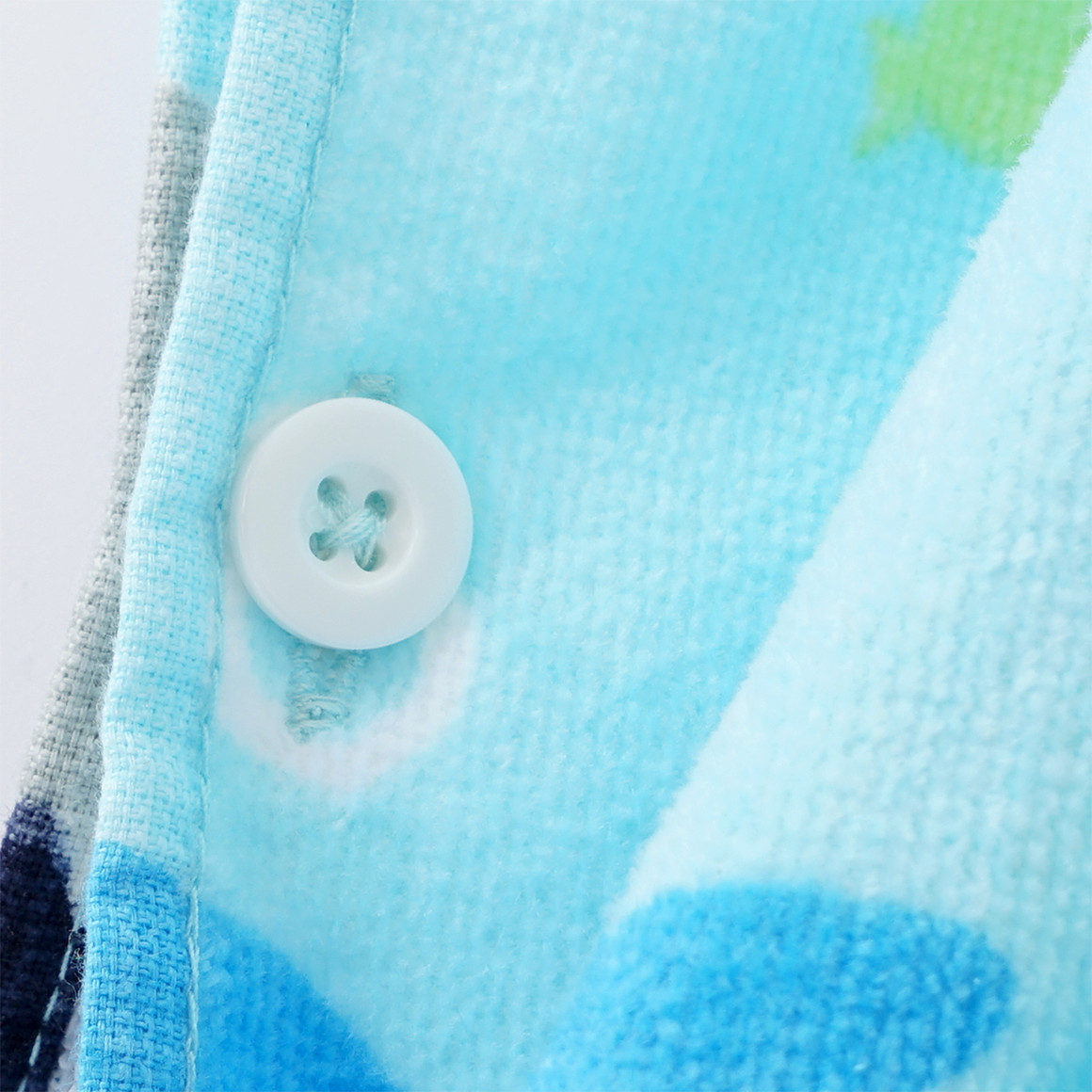 Kinder Badeponcho mit Allover-Print