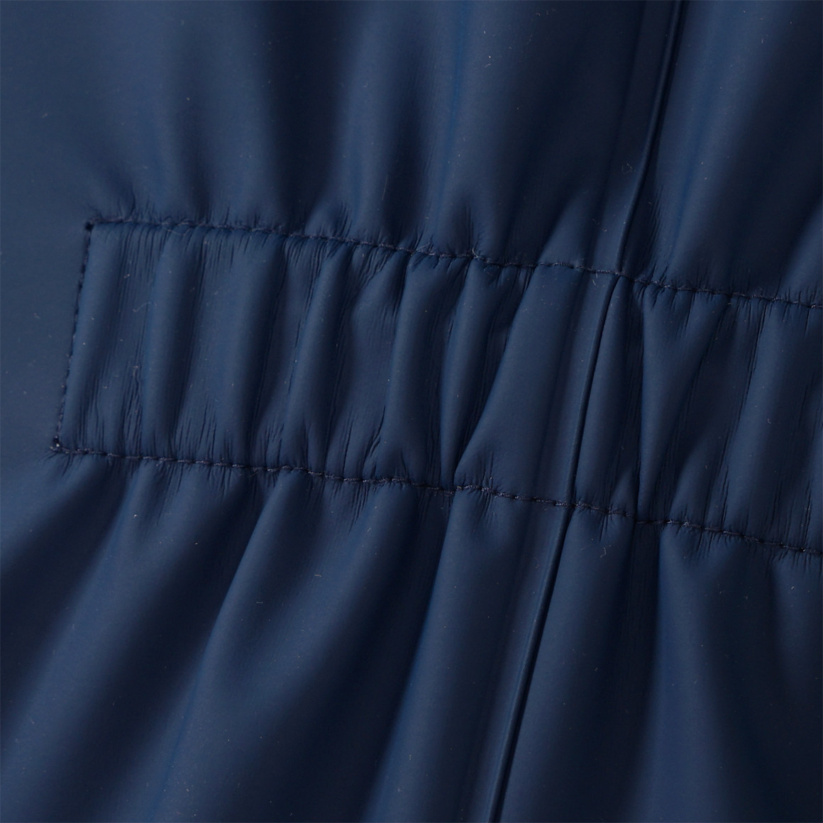 Baby regenoverall met coating