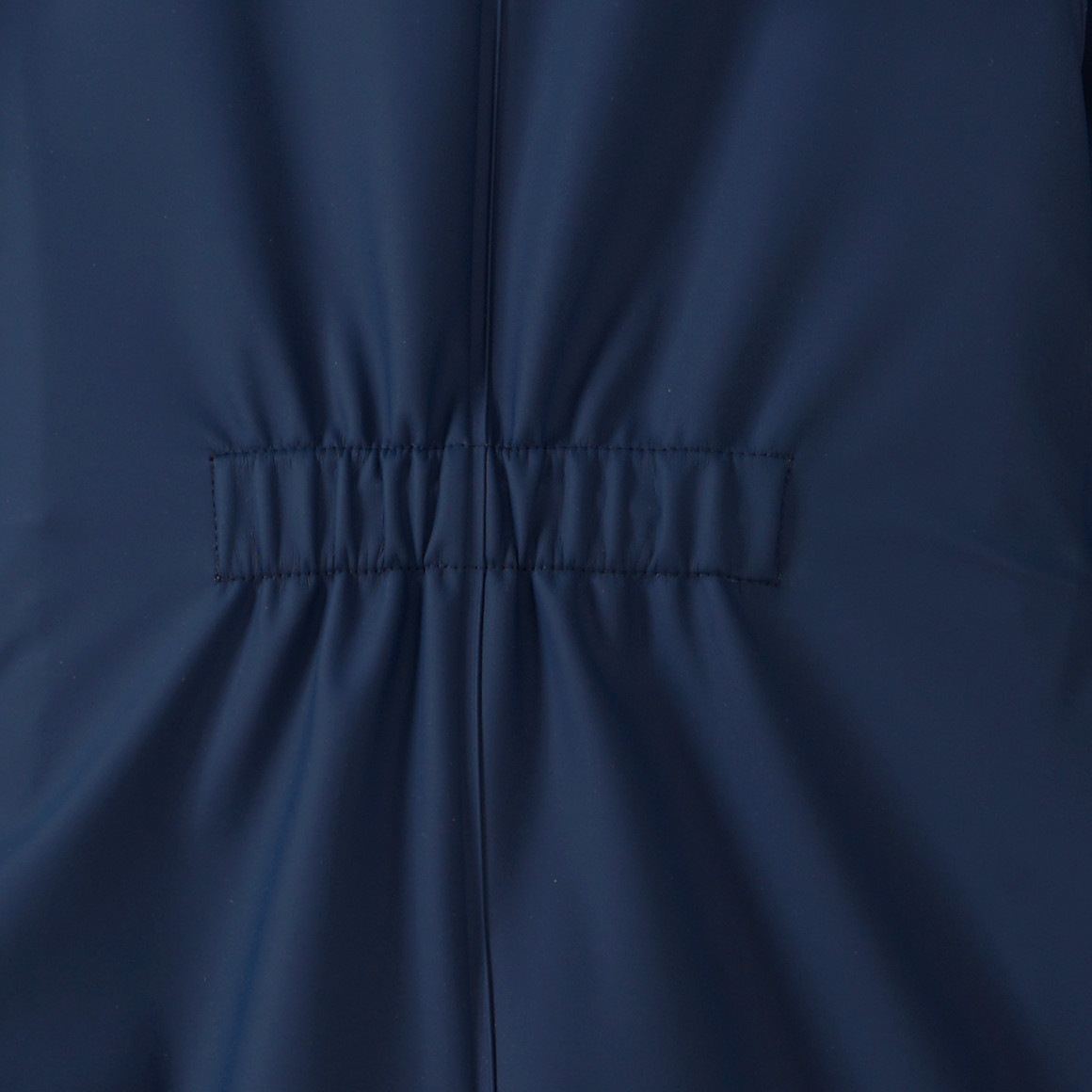 Baby regenoverall met coating