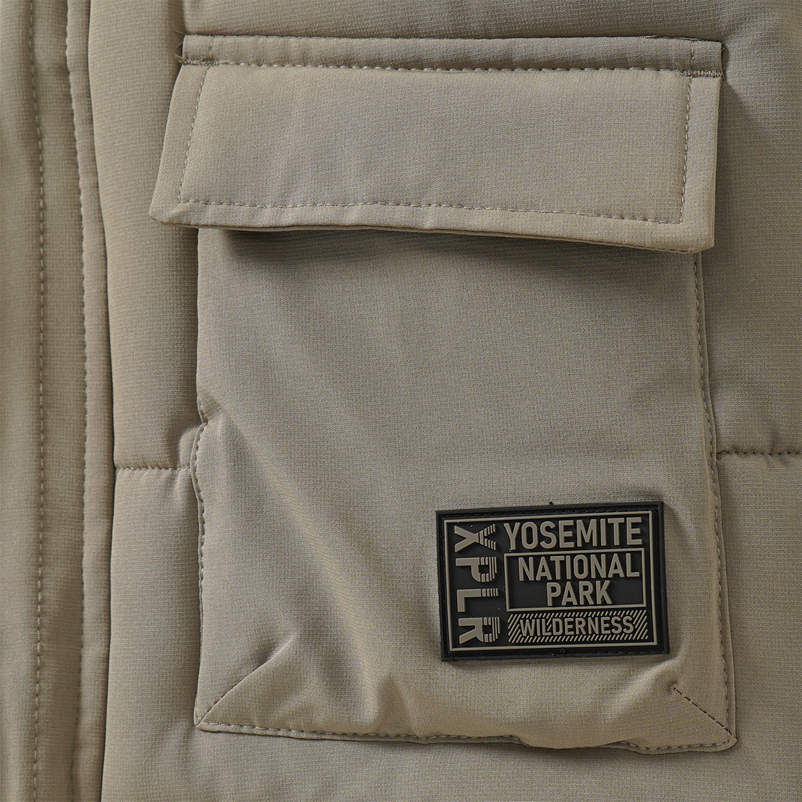 Jungen Steppjacke mit Pattentaschen