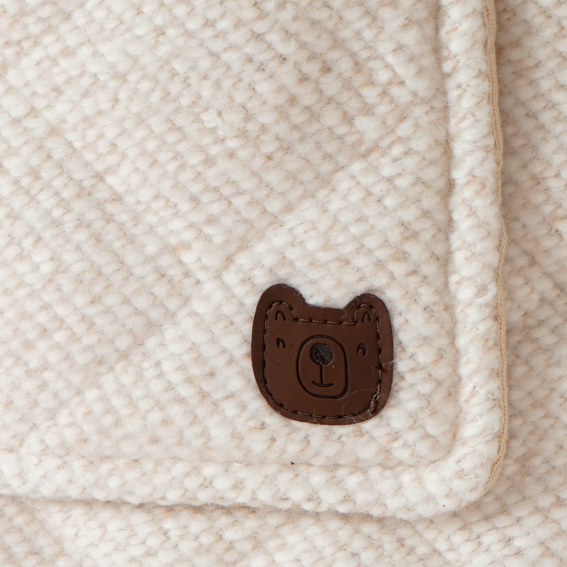 Gewatteerd babyjack in wollen look