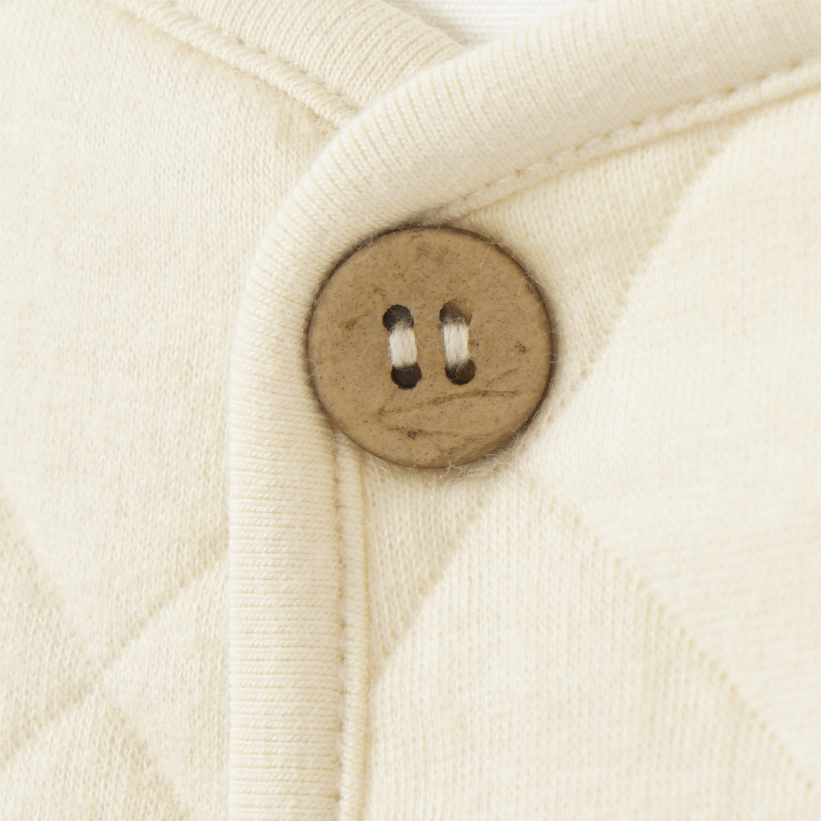 Newborn jasje met biologisch katoen