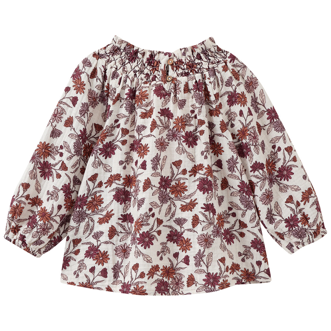 Mousseline blouse voor baby’s met smokwerk