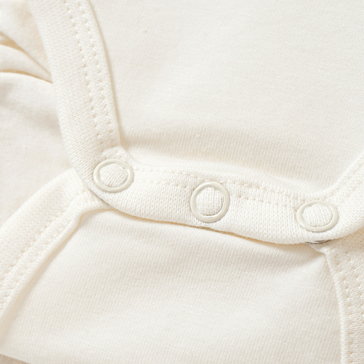 Babybody met lange mouwen en pofkraag