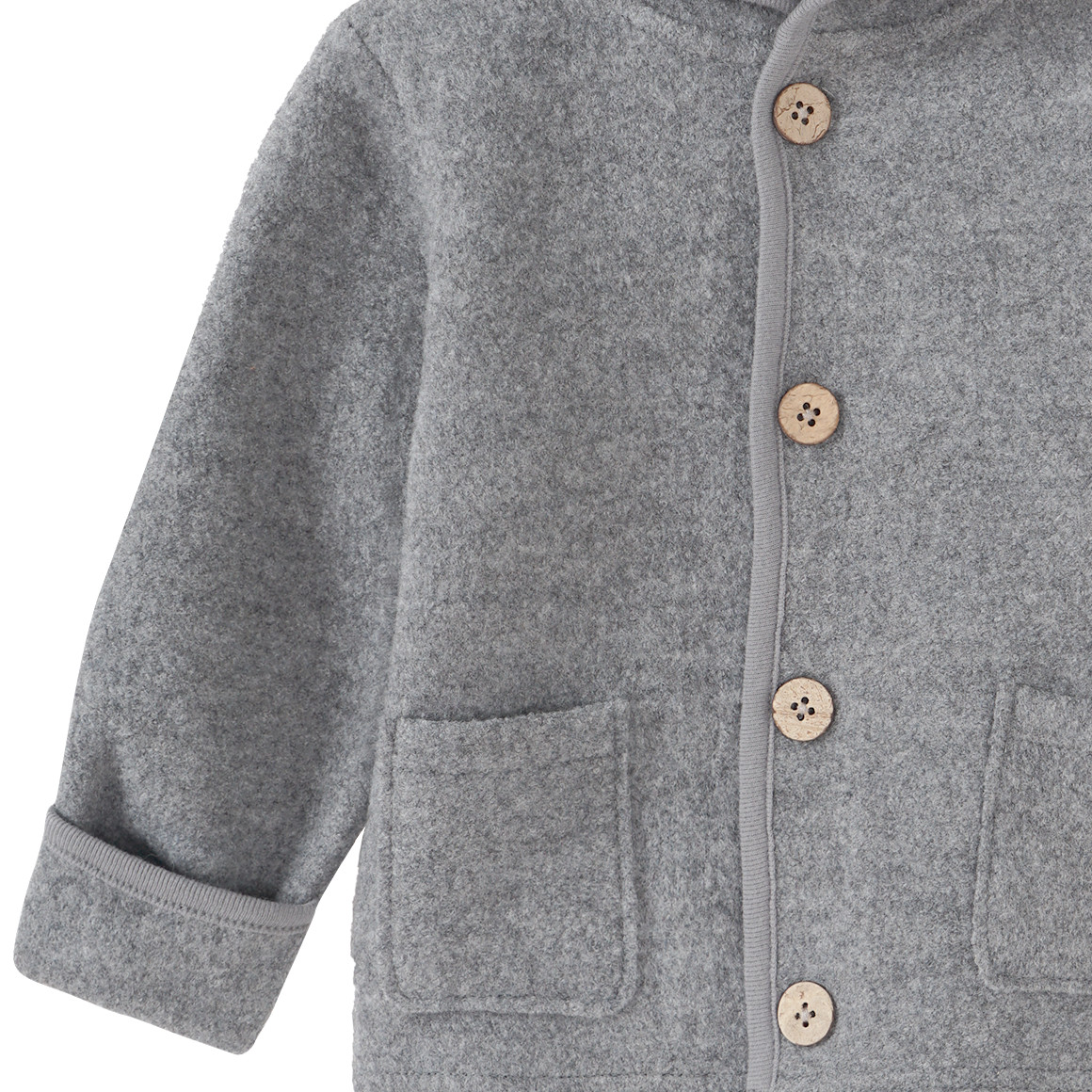 Wollen babyvest met omgeslagen boorden