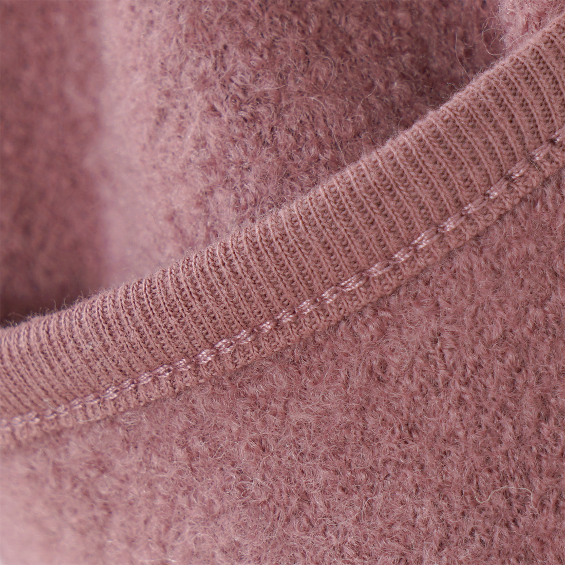 Wollen babyvest met omgeslagen boorden