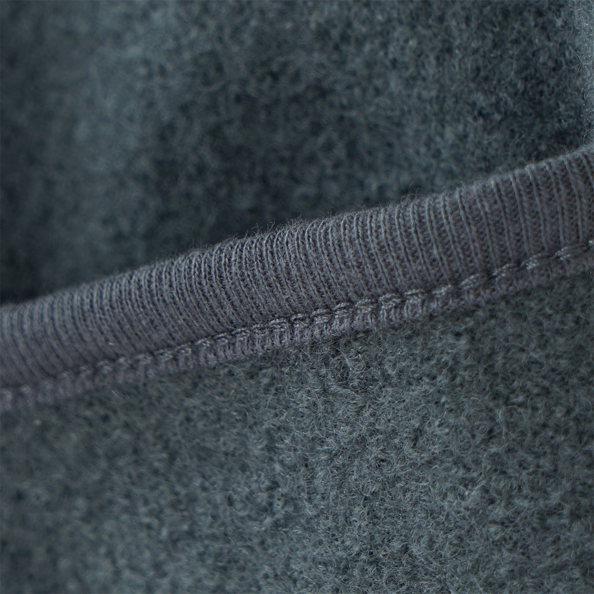 Wollen babyvest met omgeslagen boorden