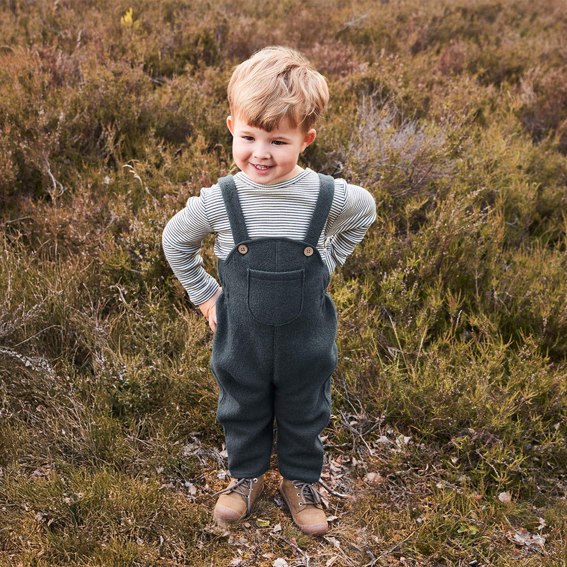 Baby wollen salopette met omgeslagen boorden