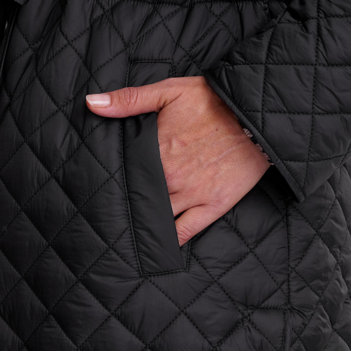 Damesjas met ruitpatroon