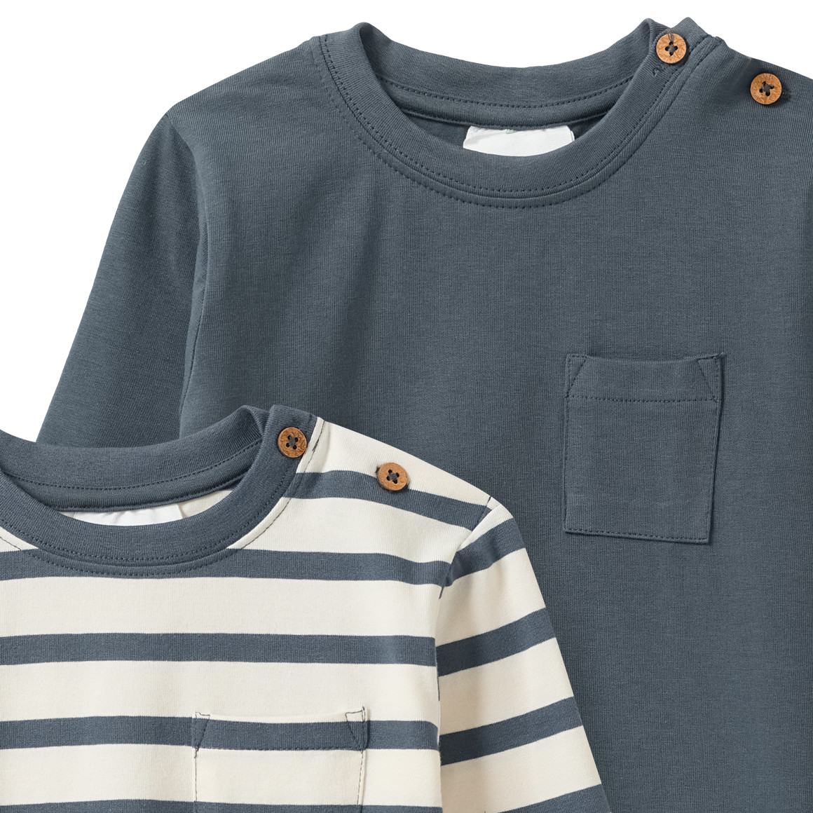 2 babyhemden met lange mouwen en borstzakje